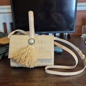 Chic Beige Crossbody Bag with Tassel Accent